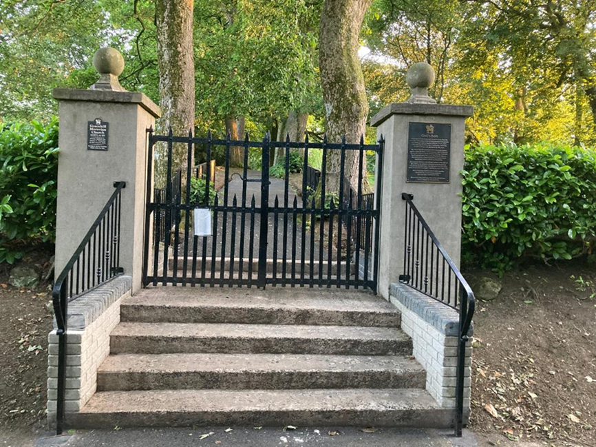 New rails and Plaque in the Burial Ground